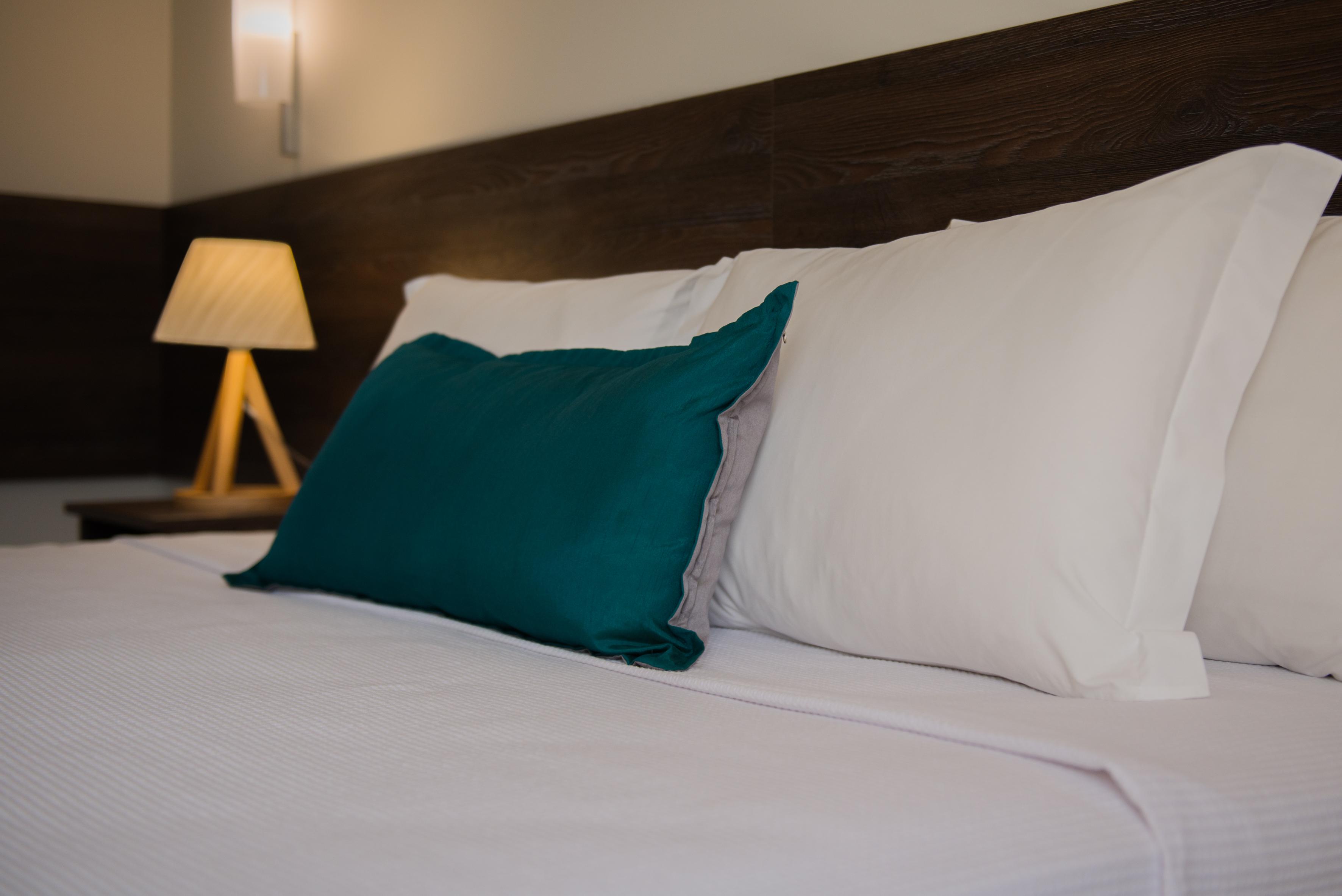 Wish Natal Hotell Exteriör bild Pillows on a bed