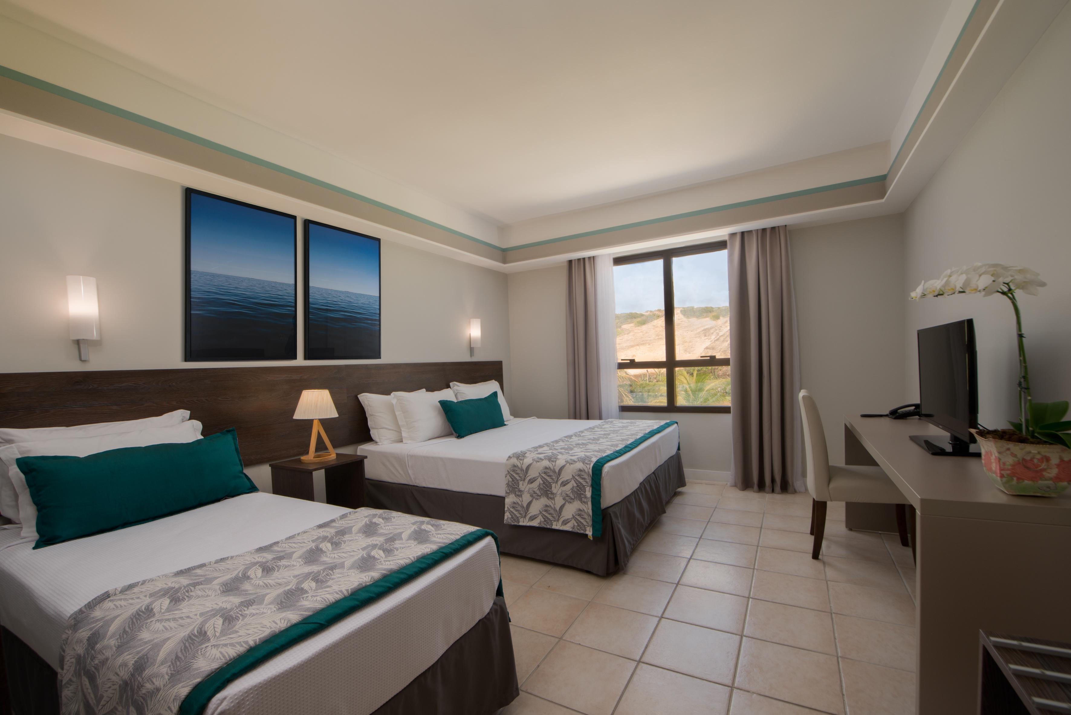 Wish Natal Hotell Exteriör bild A room at the hotel